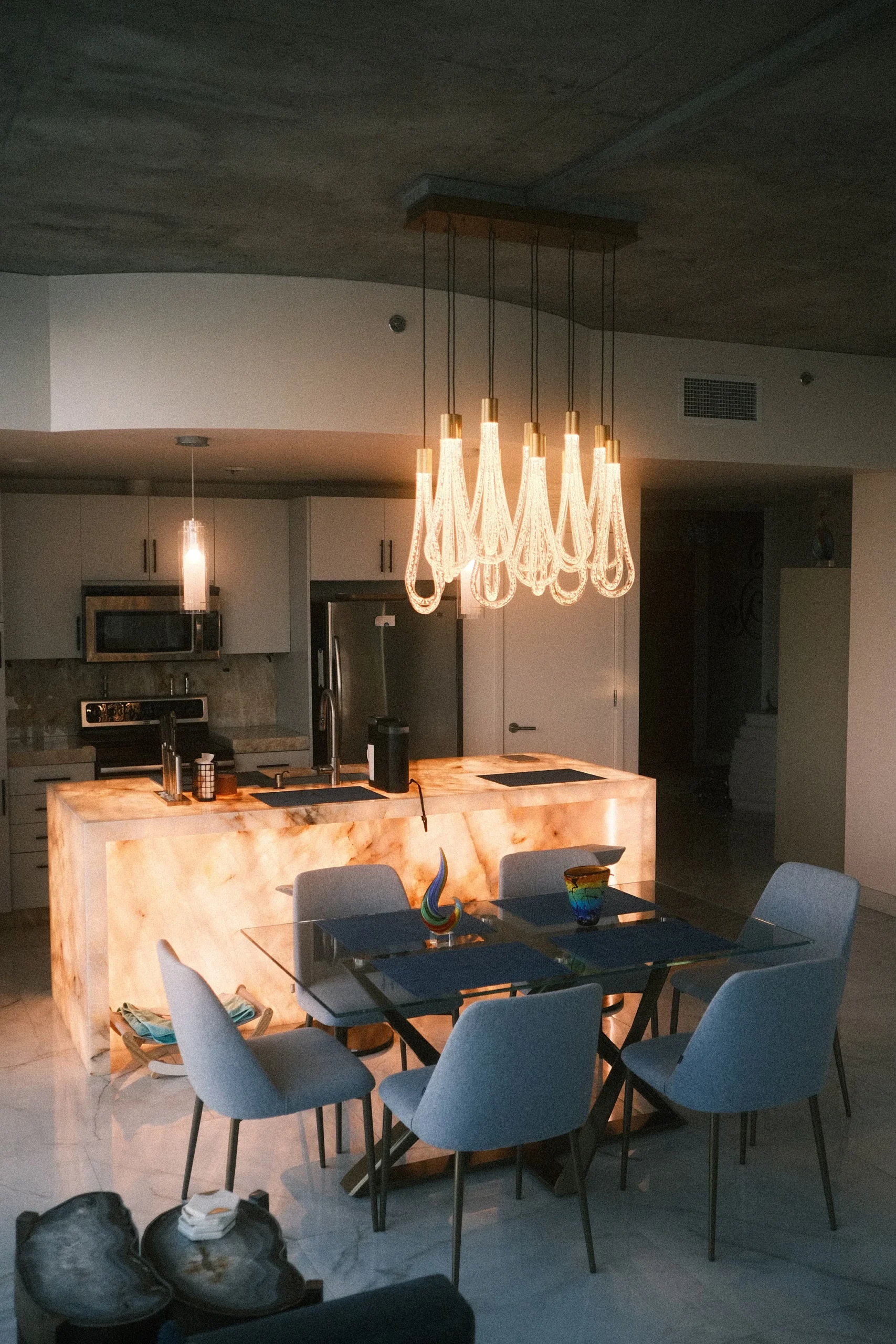 Luxury Kitchen with a Glowing Centerpiece Island in Denver by Fork River Construction